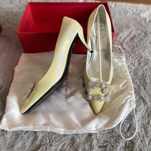 Roger Vivier Flower Faux Pearl-embellished iridescent patent leather pumps.